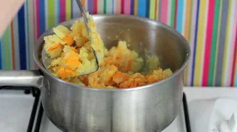 Mashing potatoes in pan Stock Footage 42177999