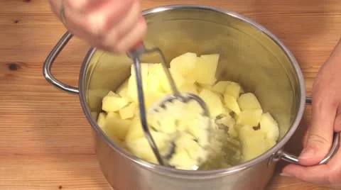 Mashing Potatoes in a Pot Stock Footage 24673351