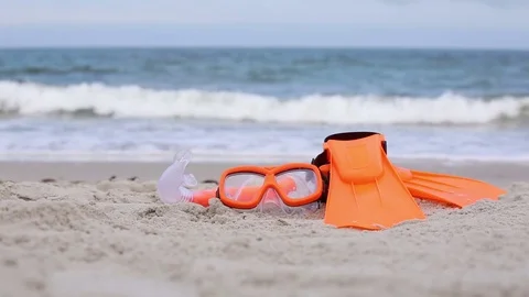 Mask and flippers diving in the background of the sea Stock Footage 83297457