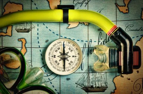 Mask and snorkel diving on map Stock Illustration