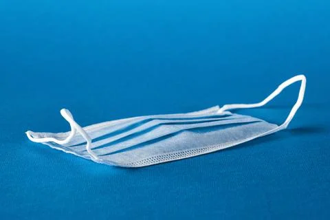 Mask on the blue background Stock Photos