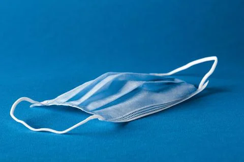 Mask on the blue background Stock Photos
