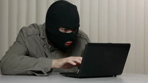 Mask Cyber Hacker Criminal Typing On Laptop Computer Stock Footage 32226286