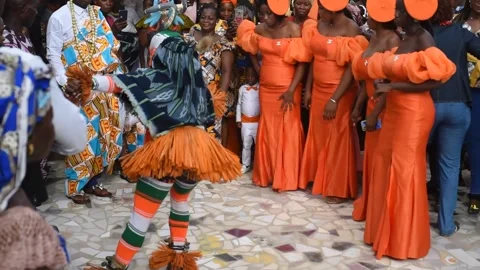 Mask dance during a wedding ceremony in Abidjan. Stock Footage 167281345