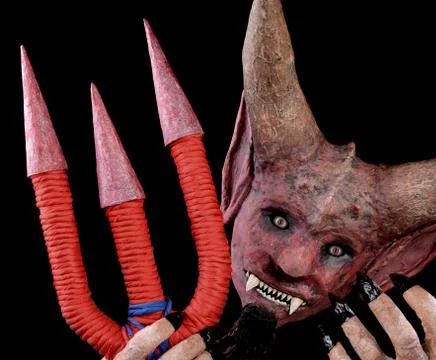 Mask of the devil with a trident Foto stock