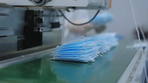 Mask factory a small business Sewing machines are make production for  genera Stock Footage 159779341