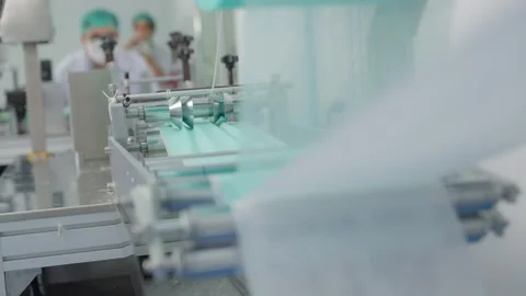 Mask factory a small business Sewing machines are make production for  genera Video stock 159792953