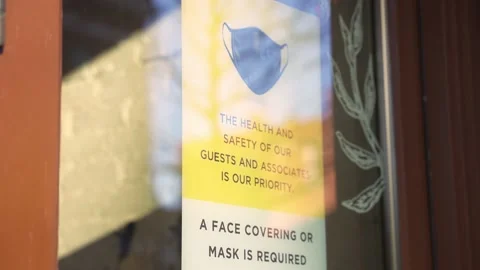 Mask Mandate Entry Paper Sign on Door Window Stock Footage 147057466