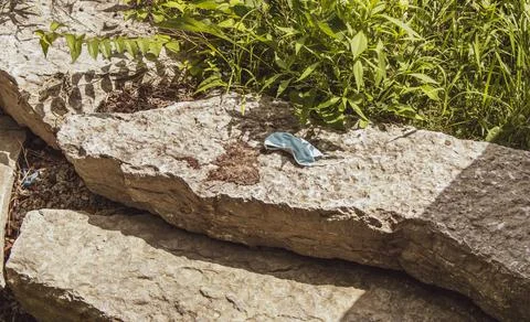 A mask on a rock Stock Photos