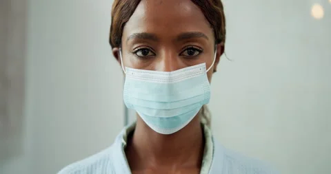 Mask, sick and face of black woman in home with safety for disease, flu or virus Stock Footage 337542923