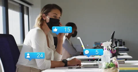 Masked call handler answering phone and animating marketing like comment Stock Footage 309895512