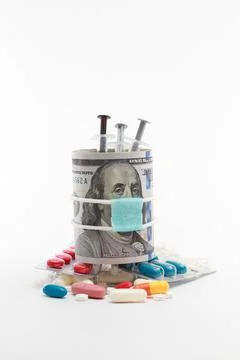Masked dollar on white background 库存照片