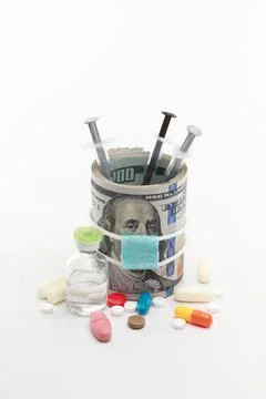 Masked dollar on white background 库存照片