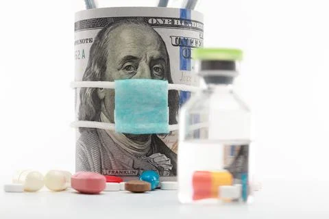 Masked dollar on white background 库存照片
