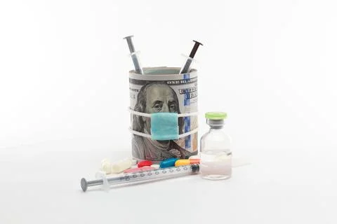 Masked dollar on white background 库存照片