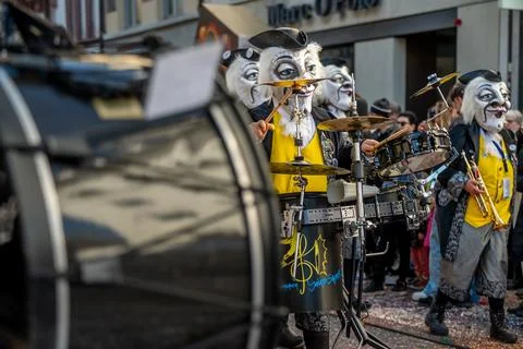 Masked Drummers Performing During Basel Fasnacht 2026 Carnival Parade Stock Photos