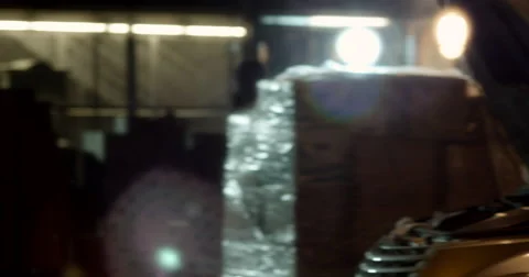 Masked Gunman Approach Inside Warehouse - Close Up Stock Footage 60680877