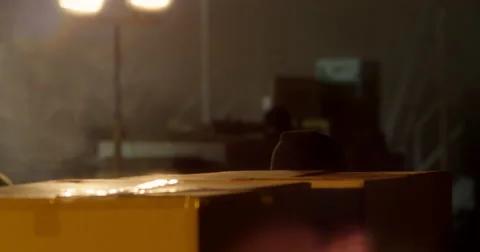 Masked Gunman Creep Forward Inside Warehouse - Close Up Stock Footage 60681190