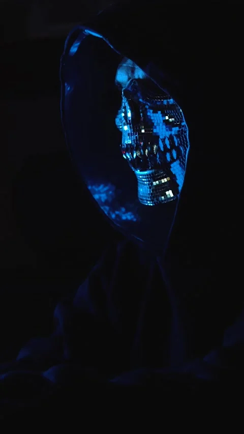 Masked hacker browsing anonymous forums on the dark web representing privacy Stock Footage 310357238