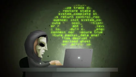 Masked hacker writing malicious code Stock Footage 342367513