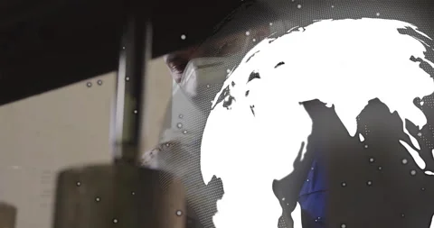 Masked lab technician examining test tube in science lab, showing animated code Stock Footage 308115516