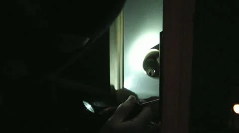 Masked Man Actor Breaking Into House Stockbeeldmateriaal 11081677
