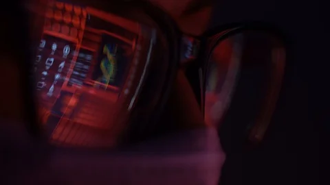 Masked man in front of a computer ,the reflection in the glasses Stock Footage 126866508