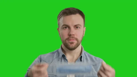 Masked man protects himself from epidemic. Young male wearing medical mask Video stock 130801341