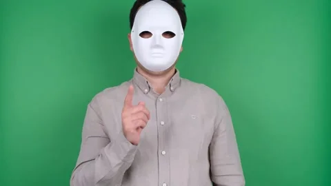 Masked man warning Stock Footage 293317185