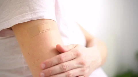 Masked mom-to-be post vaccination Stock Footage 310268064