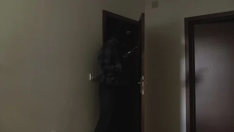 Masked murderer suffocates and kills  girl on sleep in room at house,close up. Stock Footage 87049793