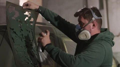 Masked painter, Precision technique, Auto perfection Stock-Footage 274363781