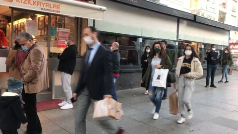 Masked people waiting in restaurant queue Stock Footage 144393055