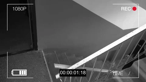 The masked robber breaks removing the surveillance camera mount Stock Footage 75314287