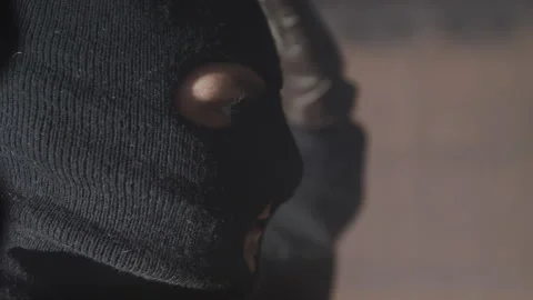 Masked Robber Puts Hands Up Stock Footage 208758147