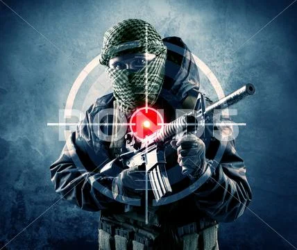Masked terrorist man with gun and laser target on his body Stock Photos