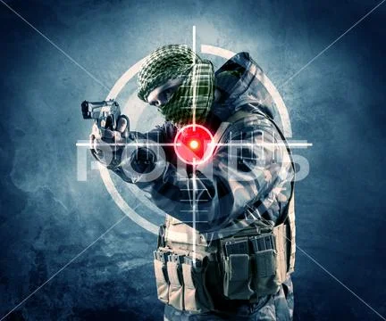 Masked terrorist man with gun and laser target on his body Stock Photos