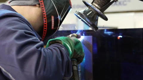 Masked welder performing welding work. Stock Footage 167348674