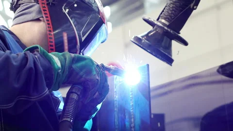 Masked welder performing welding work. Stock Footage 167669221