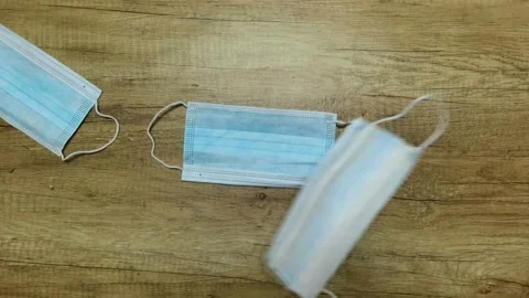 Masks appears on the surface in slow motion Stock Footage 152118288