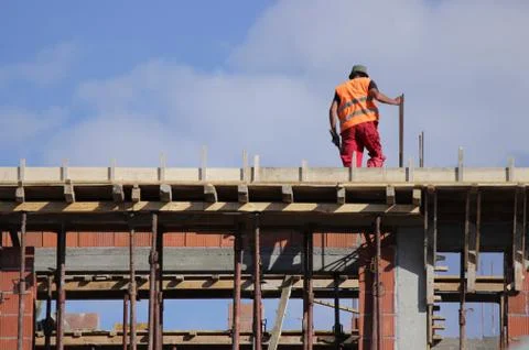 Mason on the construction site Stock Photos