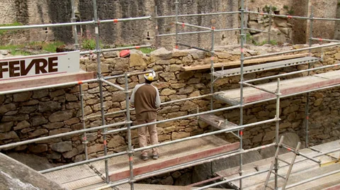 Mason doing restoration work Stock Footage 34654697