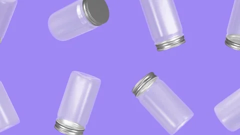 Mason Jars Falling on a Purple Background. Glass Mason Jar with Lid 3D. 4K Video stock 311373867