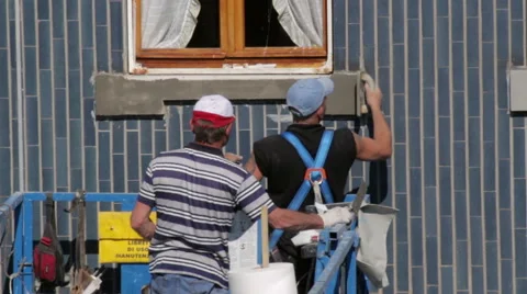 Mason putty window sill, facade renovation Stock Footage 49431422