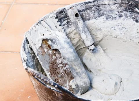 Mason tools and cement Stock Photos