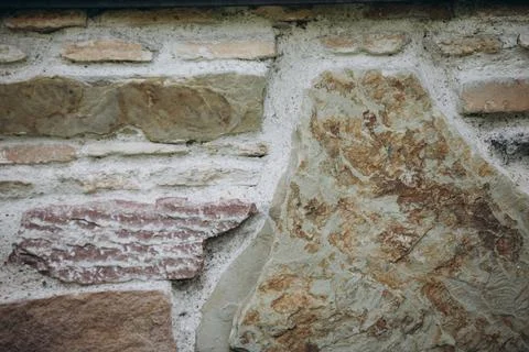Masonry element of the wall of an ancient building Stock Photos