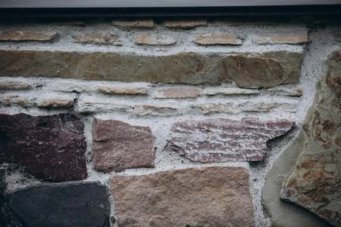 Masonry element of the wall of an ancient building Stock Photos
