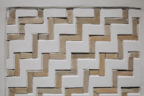 Masonry element of the wall of an ancient building Foto stock