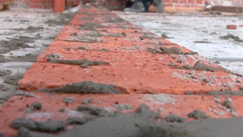 Masonry of a large red brick. Stock Footage 144651589