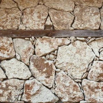Masonry light rubble stone. Stock Photos
